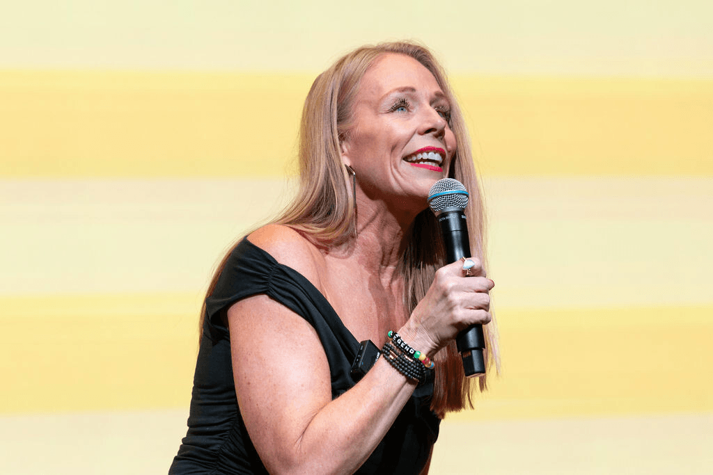 Amy Stockberger speaking on stage
